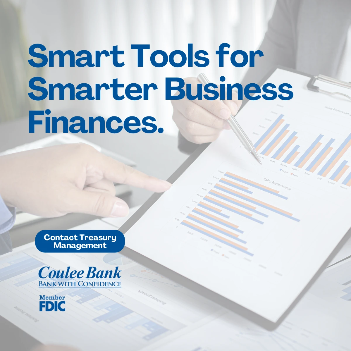 Two people reviewing graphs for smarter business tools for your finances at Coulee Bank.